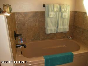 The guest bath has a tub & shower